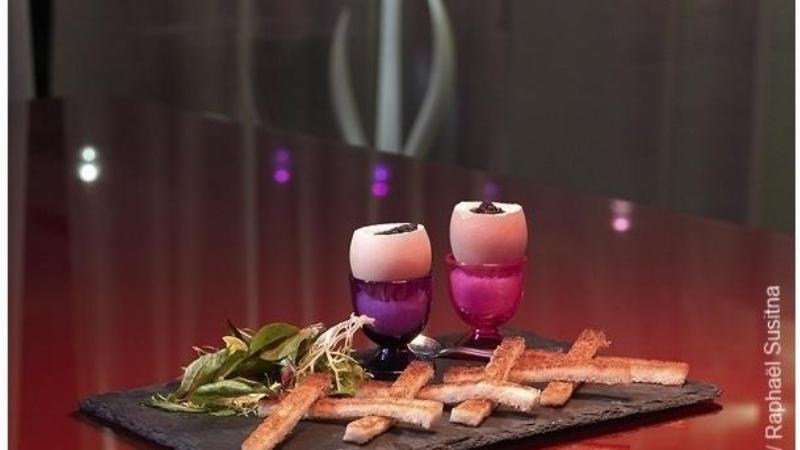 Les majestueuses façades haussmanniennes du 36 rue Notre-Dame-de-Lorette 75009 Paris, avec des balcons en fer forgé et des toits de zinc.